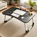 a bedside computer desk a curved sturdy folding